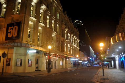 Australian People Walking On Pavement In Night Time At St Georges