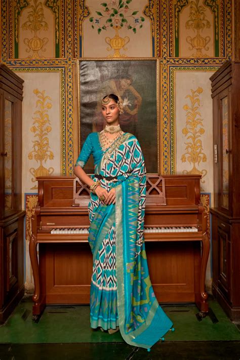 Printed Smooth Patola Silk Saree In Blue Ucchal Fashion