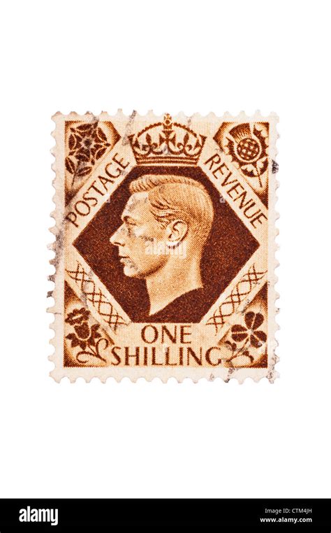 A King George Vi One Shilling Brown 1s Postage Stamp On A White