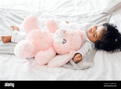 Sweet Dreams Baby Girl A Baby Girl Sleeping In Her Bed Stock Photo Alamy