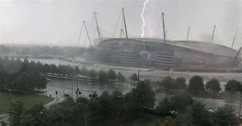 LIVE Greater Manchester weather updates as heavy downpours hit with ...