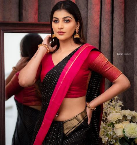 Yashika Aannand Hot Images Sizzling Hot Red Saree Pics Of Yashika