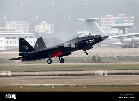 A Chinese J-31 stealth fighter jet takes off for a demonstration flight ...