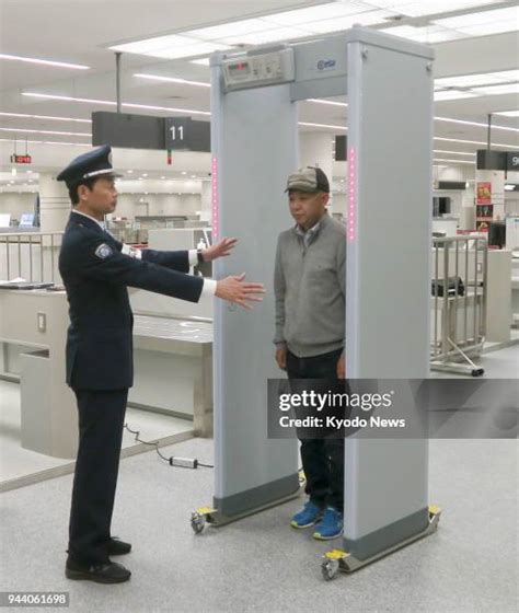 54 Walk Through Metal Detector Airport Stock Photos, High-Res Pictures ...