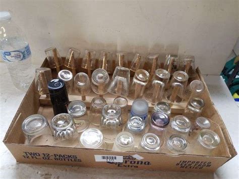 Large Lot Of Shot Glasses And Wooden Shot Glass Holder - Trice Auctions