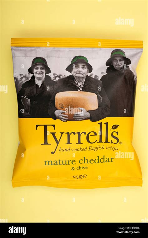 Tyrrells Mature Cheddar Chive Hand Cooked English Crisps Stock Photo