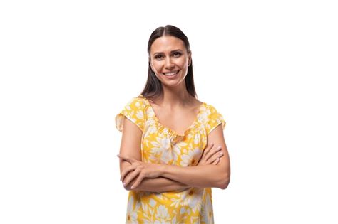 Premium Photo Year Old Brunette Woman Dressed In A Summer Outfit Looks Confidently At The Camera
