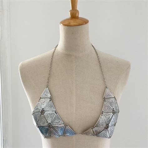 Vintage Silver Metal Bikini Style Top Displayed On Depop