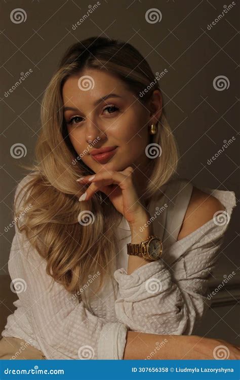 Portrait Of A Cute Beautiful Blonde With A Pretty Face Stock Photo