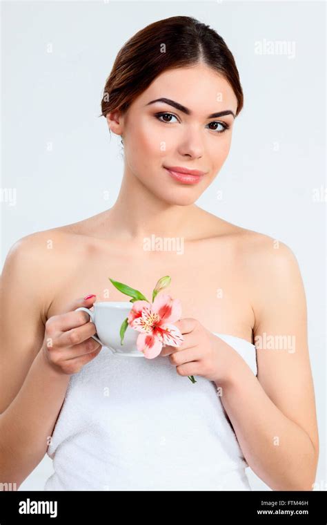 The Attractive Brunette Beautiful Girl With Cup Of Herbal Tea On White Background Youth And