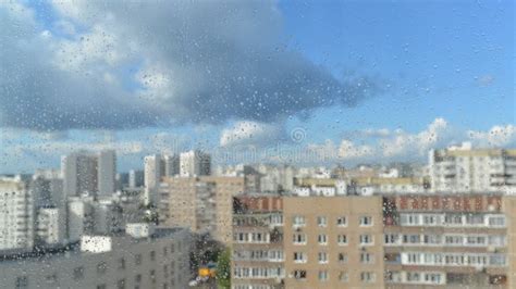 Drops Of Rain On A Window Pane Buildings In Stock Video Video Of