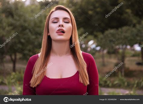 Woman Imitate Orgasmic Face She Wear Casual Sexy Outfit Standing Stock