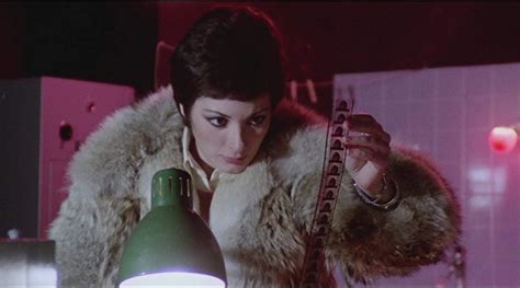 STRIP NUDE FOR YOUR KILLER Review By Maitland McDonagh ALLIANCE OF WOMEN FILM JOURNALISTS