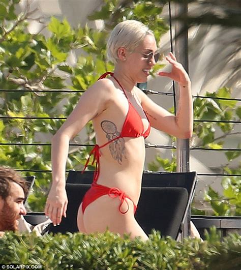 Miley Cyrus Strips Down To Grey And Black Bikini In Barcelona Daily Mail Online