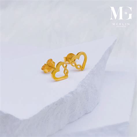 gold glossy heart  infinity stud earrings merlin goldsmith