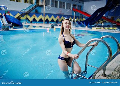 Blonde Girl In Blue Swimsuit Having Rest In Swimming Pool Of Aqua Park Stock Image Image Of