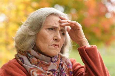 Premium Photo Close Up Portrait Of Thoughtful Senior Woman