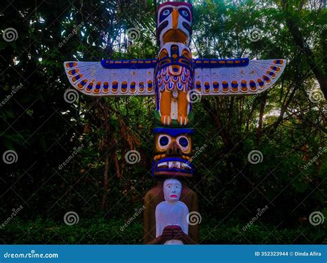 Original Totem Poles Representing Art And Religious Symbols Stock Photo