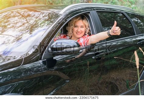 Adult Blonde Woman Gives Thumbs While Stock Photo 2206171675 Shutterstock