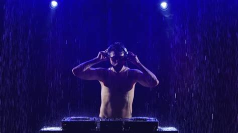 Sporty Half Naked Male Disc Jockey Works On The Controller A Professional Dj Makes A Live