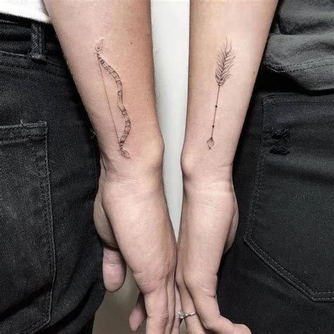 Fine Line Bow And Arrow Matching Tattoo For Couples