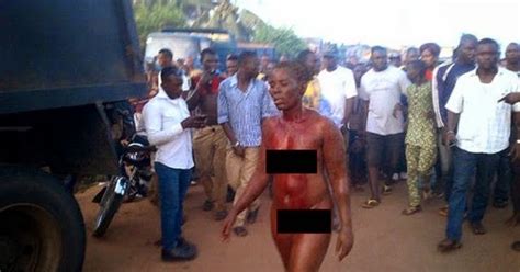 Gista Naija Female Kidnapper Stripped Naked Beaten And Paraded In Ogun State PHOTOS