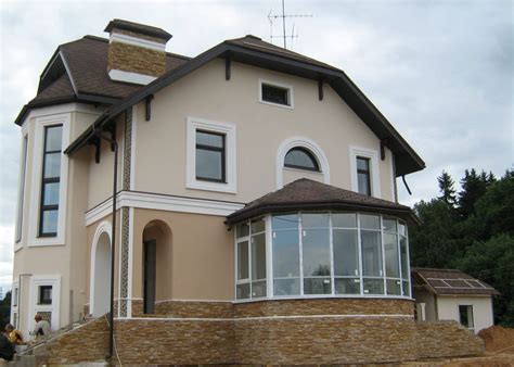 Штукатурные фасады домов - 56 фото