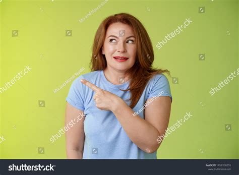 Excited Intrigued Middleaged Mature Redhead Woman Stock Photo 1953358255 Shutterstock