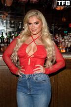 Liberty Poole Sexy Poses Showing Off Her Hot Cleavage In A Photoshoot