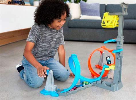 Ripley VEHICULO HOT WHEELS GRW ACTION DESAFIO ALTURA