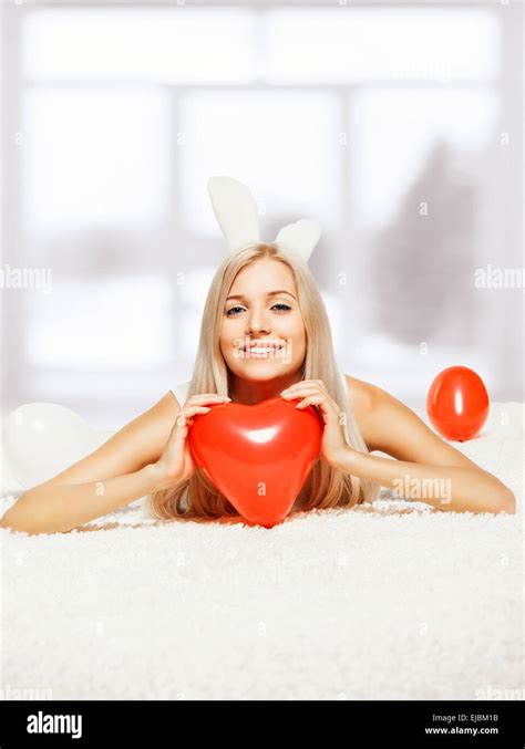 Blonde Woman With Balloons Stock Photo Alamy
