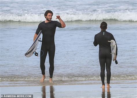 Chris And Liam Hemsworth Hit The Beach In Byron Bay With Bikini Clad Model Gabriella Brooks