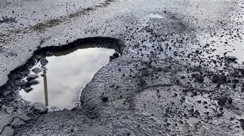 As Height Of Pothole Season Nears Drivers Dodge Craters While City Struggles To Patch Them