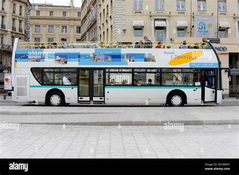 Marseille Sightseeing Bus With Passengers Travelling Through The City