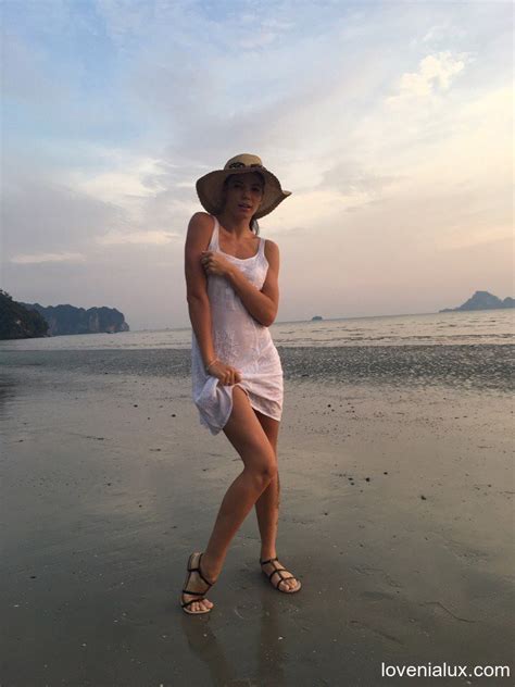 Sweet Babe Lovenia Lux Posing In A White Dress On The Beach Photos