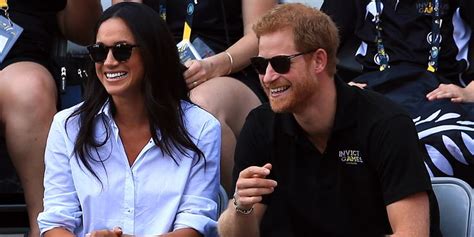 Prince Harry And His Wife Are Sitting Next To Each Other