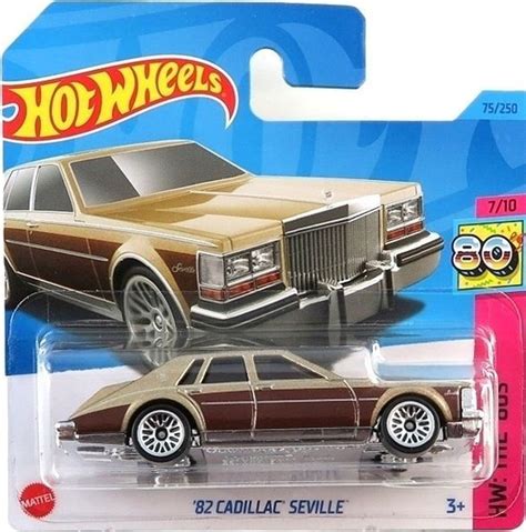 Игрушечная машинка Hot Wheels 82 Cadillac Seville Metalflake Gold базовая коллекция 2023 г 75