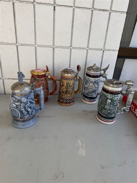 5 Avon steins