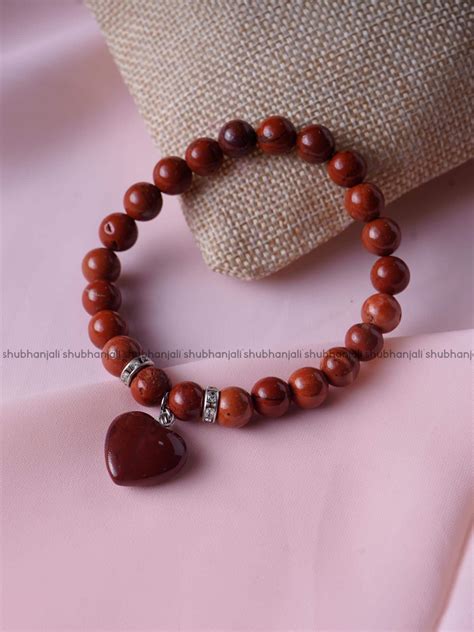 Buy Red Jasper Bracelet With Mini Heart Charm Shubhanjali