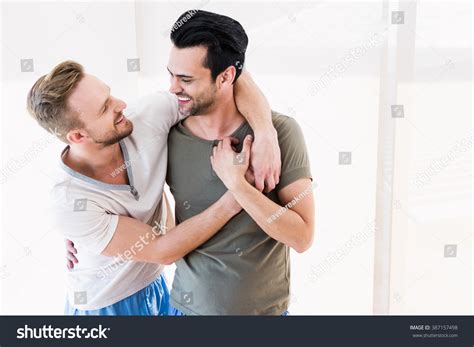 Smiling Gay Couple Hugging Home Stock Photo Shutterstock
