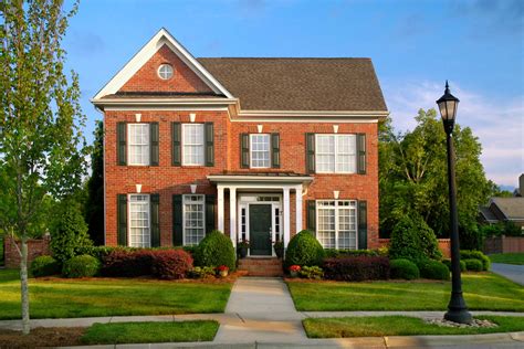 how much does it cost to paint brick house