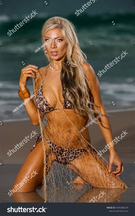 Sexy Blonde Bikini Girl Posing On Stock Photo 1645486270 Shutterstock