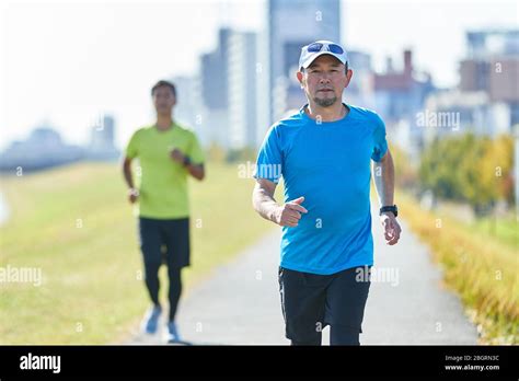 Mature Japanese Man Training Downtown Stock Photo Alamy