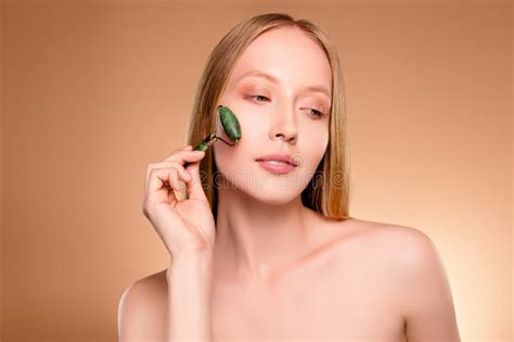 Photo Of Adorable Stunning Lady Nude Shoulders Enjoy Skin Massage Isolated Beige Color