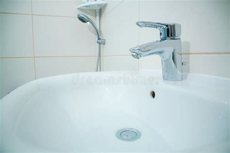 Chromed Metal Faucet For Hot And Cold Water In A Modern Bathroom Stock Image Image Of Bathroom