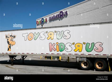 A Logo Sign Outside Of A Toys R Us And Babies R Us Retail Store In