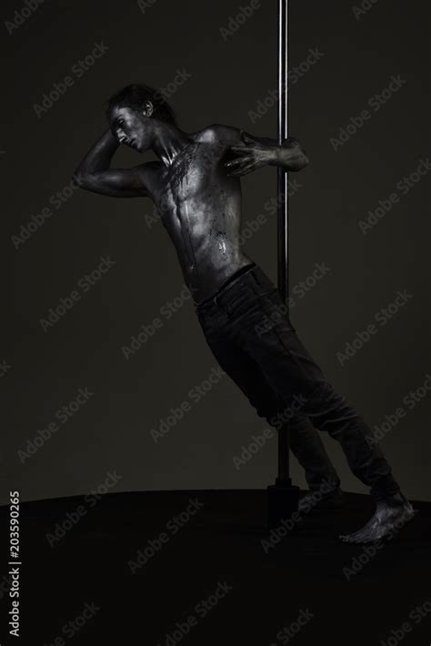 Man With Nude Torso Covered With Shimmering Paint Dark Background Stock Photo Adobe Stock