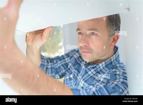 Kitchen Fitter At Work Stock Photo Alamy