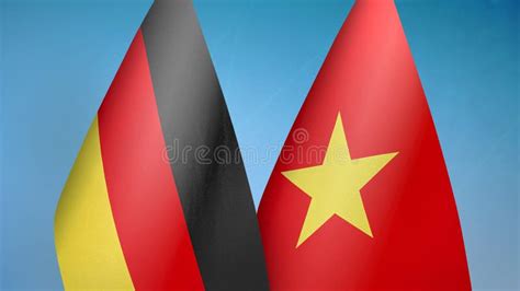 Vietnam And Germany Two Flags Textile Cloth Fabric Texture Stock