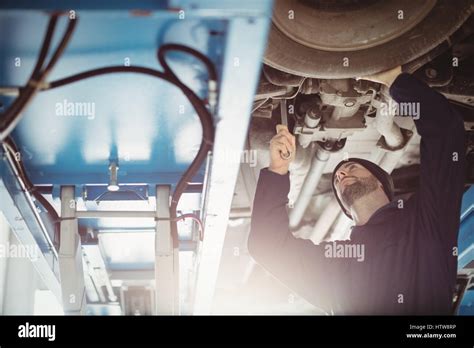 Mechanic Fixing A Car Stock Photo Alamy
